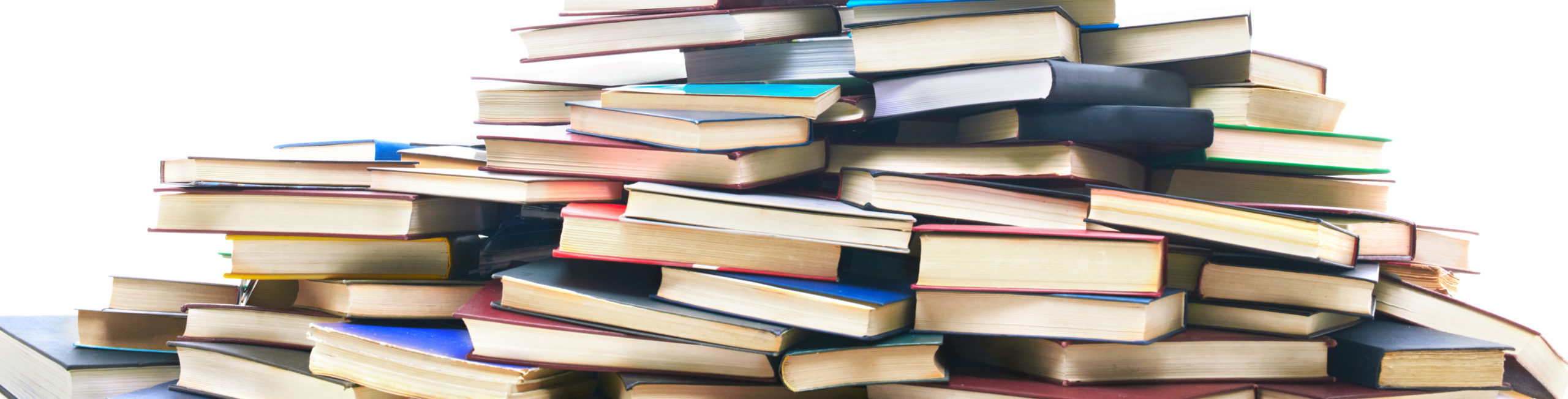 concentrated girl surrounded by books scaled e1660815598818
